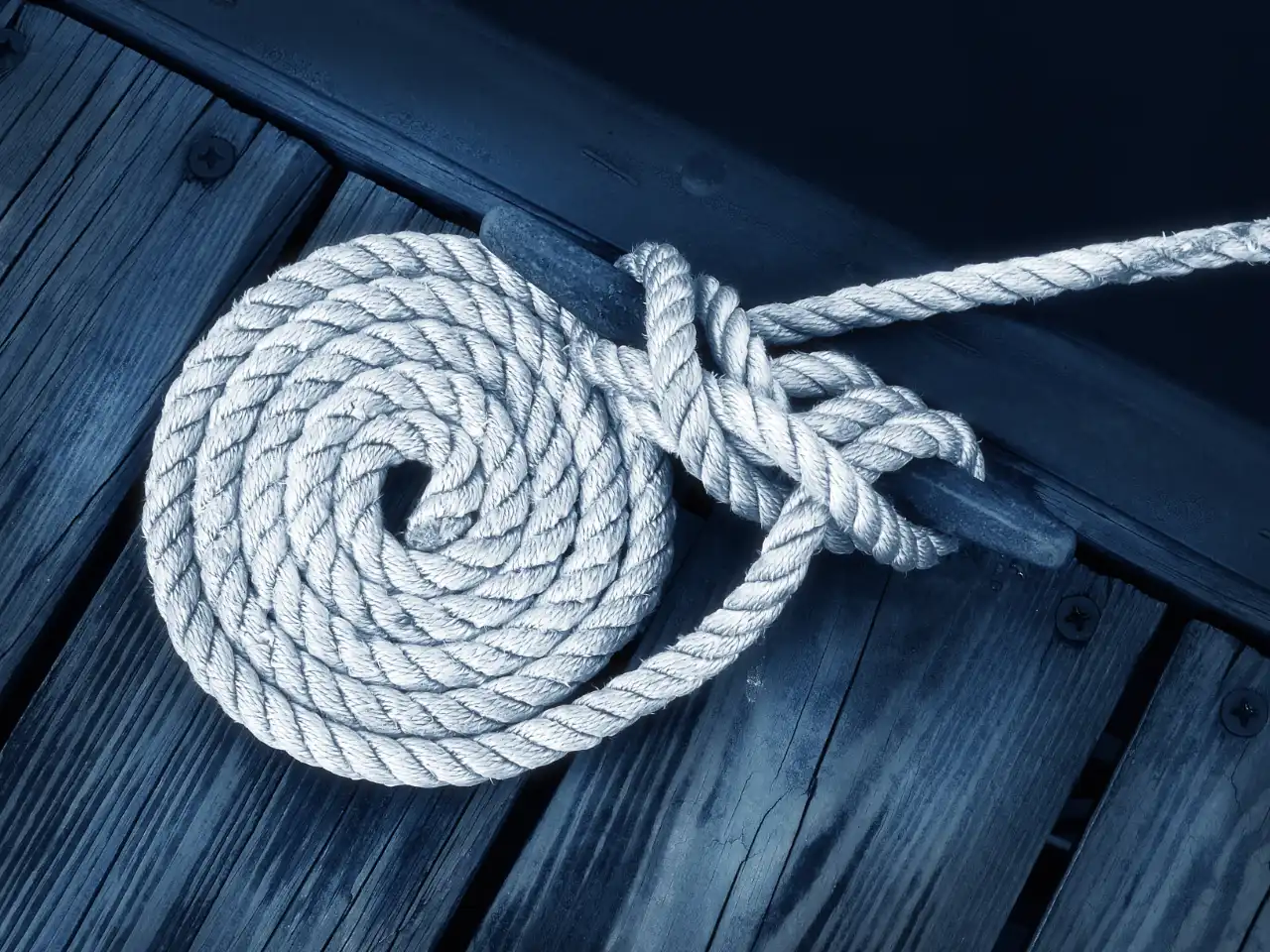 rope firmly cleated to deck