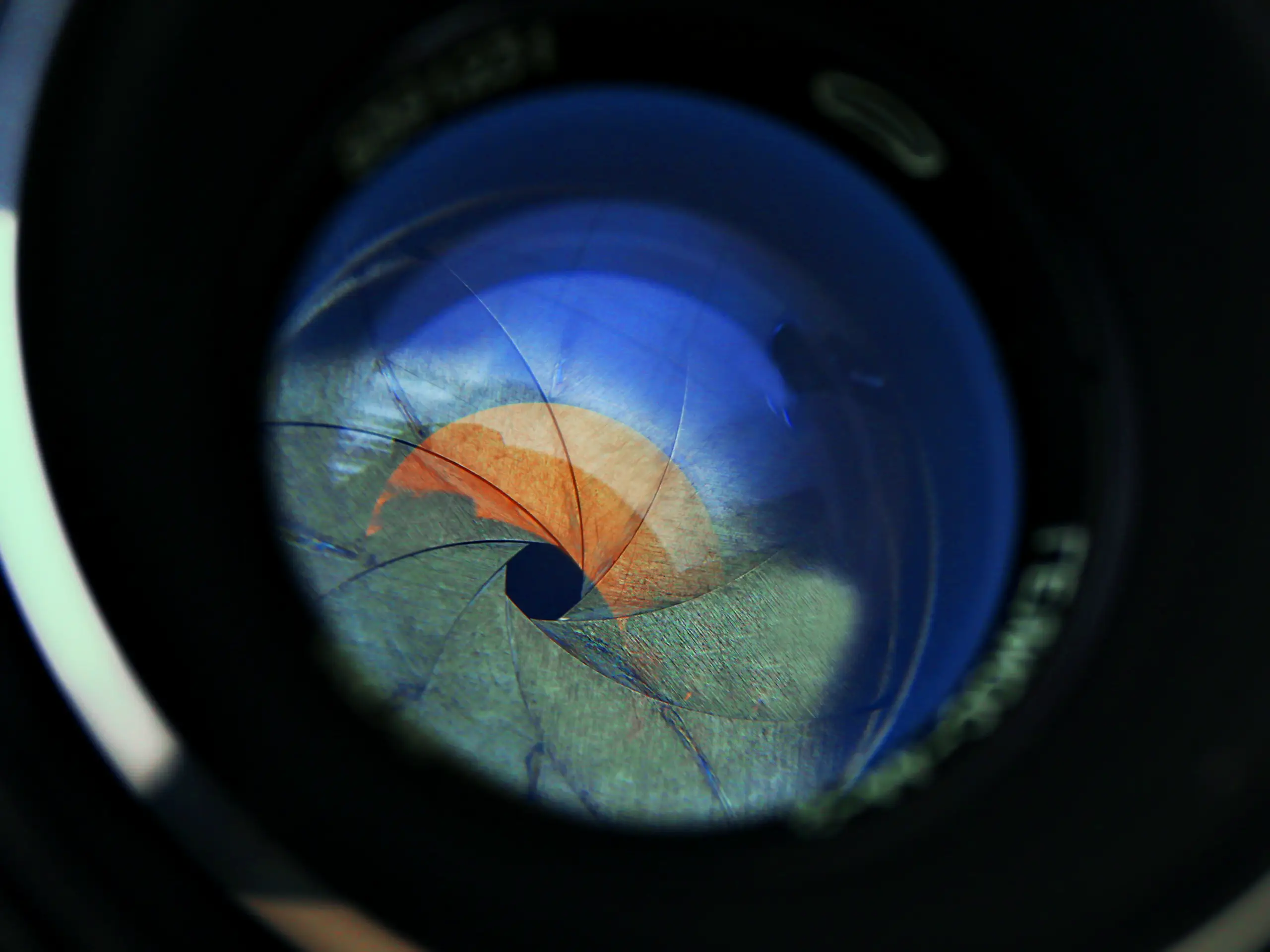 closeup of camera lens iris resembling human eye